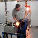 Shaping molten glass