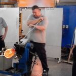Shaping molten glass