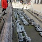 Leftovers stacked on the side of the building.