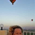 Ellen enjoys the balloons