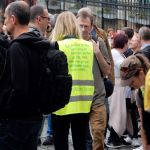 Intermix of protesters and visitors