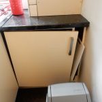 Cabinet doors with broken hinges