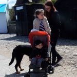 Woman with hands full