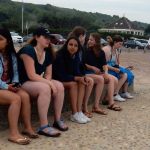 Bored girls on a bench