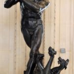 Hercules whacking 3-headed dog