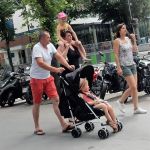 Fun ride on mom's shoulders