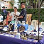 Closely looking at the merchandise